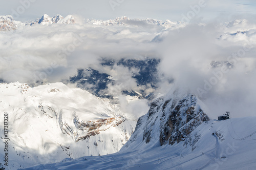 Sunny view of Dolomites from Marmolada glacier of Arabba, Trentino-Alto-Adige region, Italy.