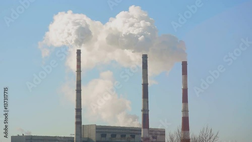 Thin tube power plants emit smoke photo