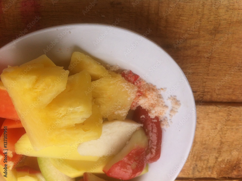Rujak, Indonesia Salad Fruit at Wooden Board
Rujak, Indonesia Salad Fruit at Wooden Board