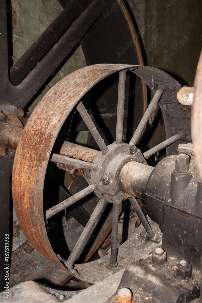 Rusty wheel in an old factory