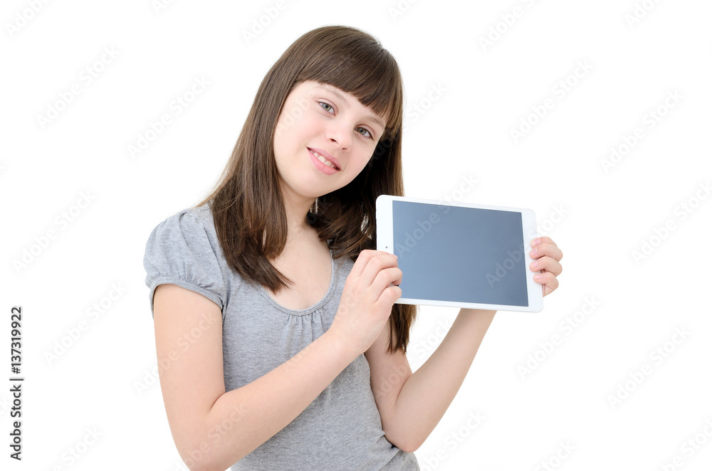 Teen girl uses a gadget, isolated on white background. Teen girl uses a gadget, isolated on white background.