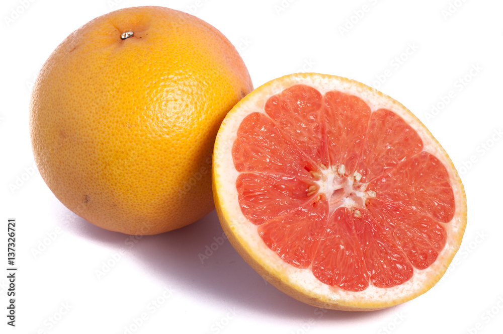 One and a half cut grapefruit isolated on white background One and a half cut grapefruit isolated on white background