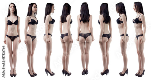 Turning around slim woman in black lingerie