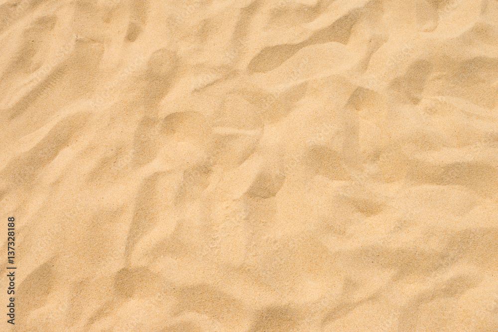 Sand on the beach as background Sand on the beach as background