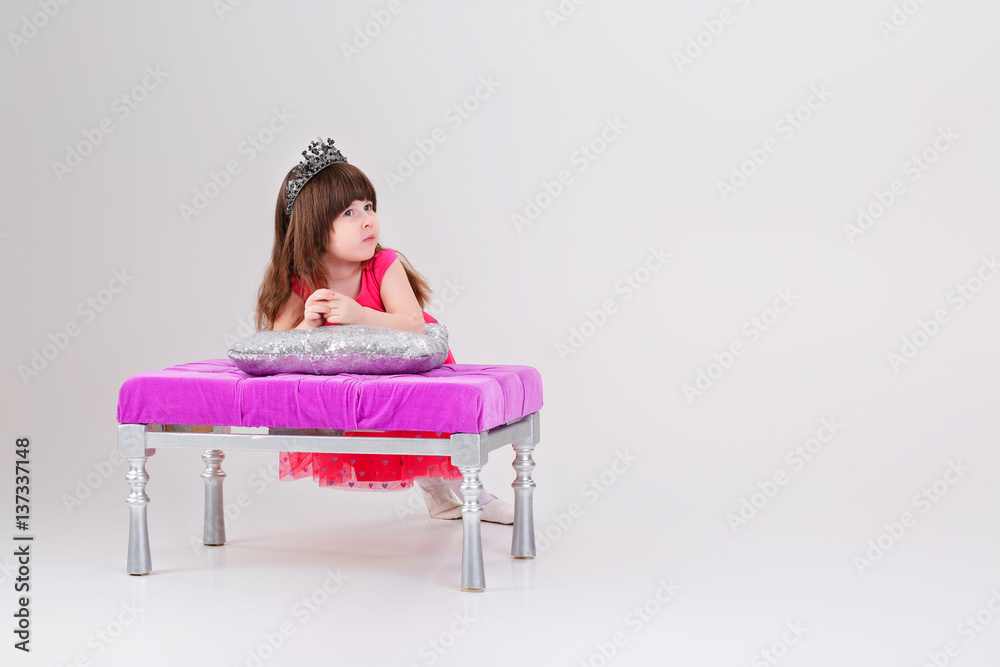 beautiful little girl in pink Princess dress with crown sitting Stock ...