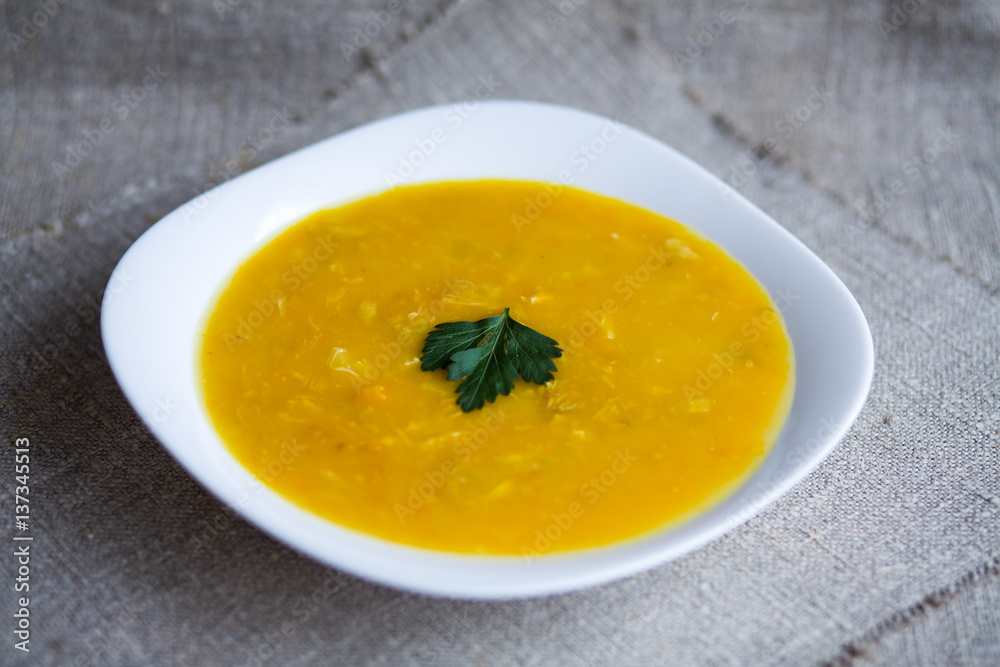 Soup with pumpkin, potatoes, cream, cheese and chicken. First course. Soup with pumpkin, potatoes, cream, cheese and chicken. First course.