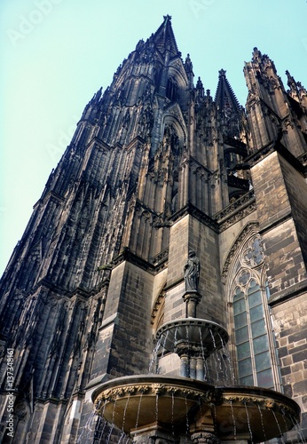 Great view for Gothic Cologne Cathedral built in Medieval period. The most beautiful mysterious catholic monument / building in Germany