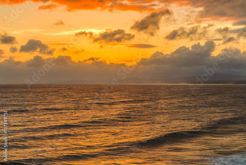 ocean and seascape in beautiful orange sunset