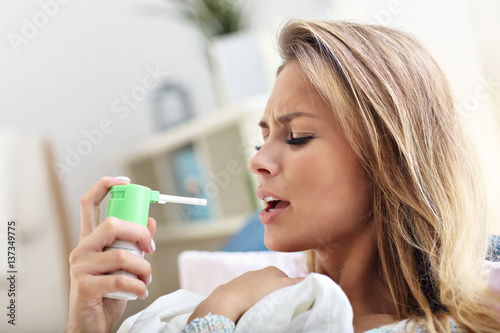 Sick woman at home photo