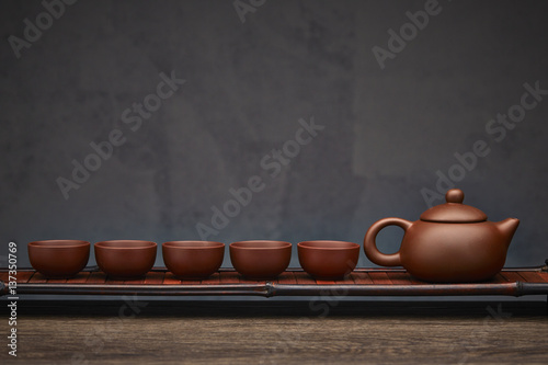  Traditional tea ceremony accessories, teapot and teacup with wooden background