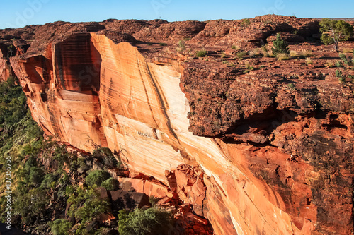 Towering cliffs of Kings Canyon, Watarrka National Park in spectacular late afternoon light, Northern Territory, Australia