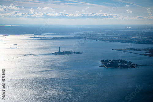 Aerial view of Upper New York Bay with Liberty Island and Liberty Statue - New York, USA photo