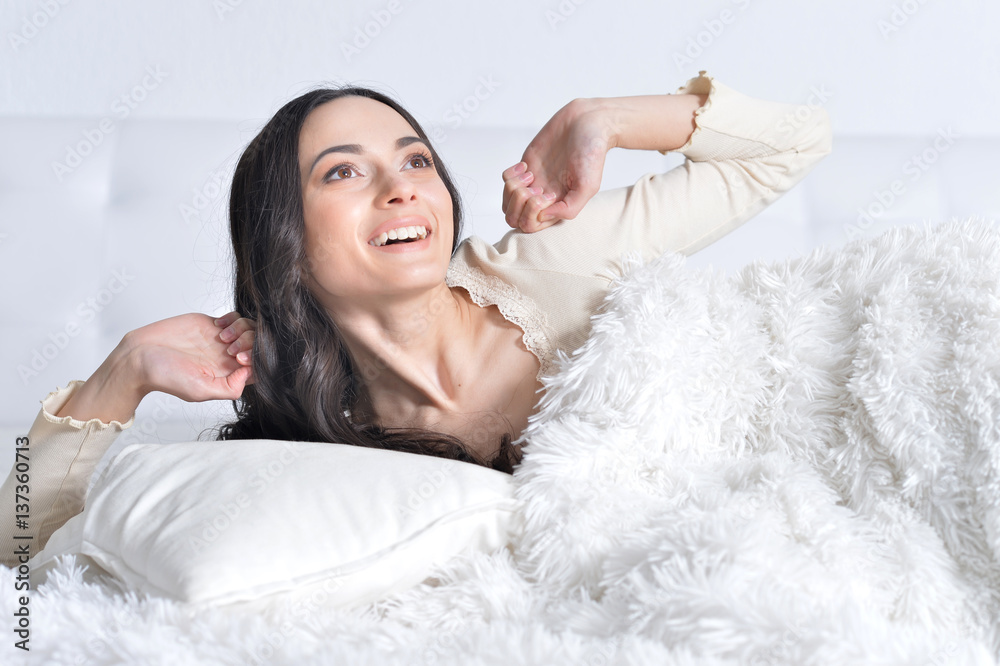 young woman waking up