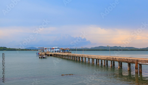 Concrete pier in Chanthaburi bay at sunset, Thailand © Akarapong Suppasarn