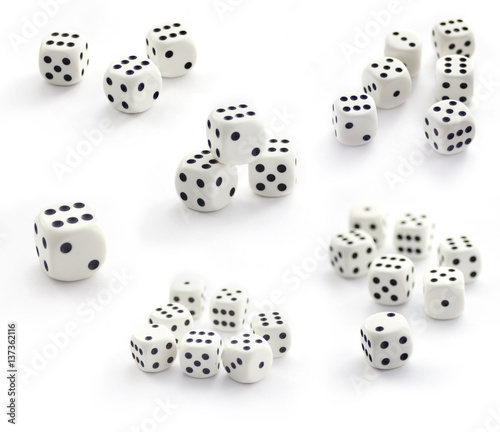 Collection of white dices isolated on white