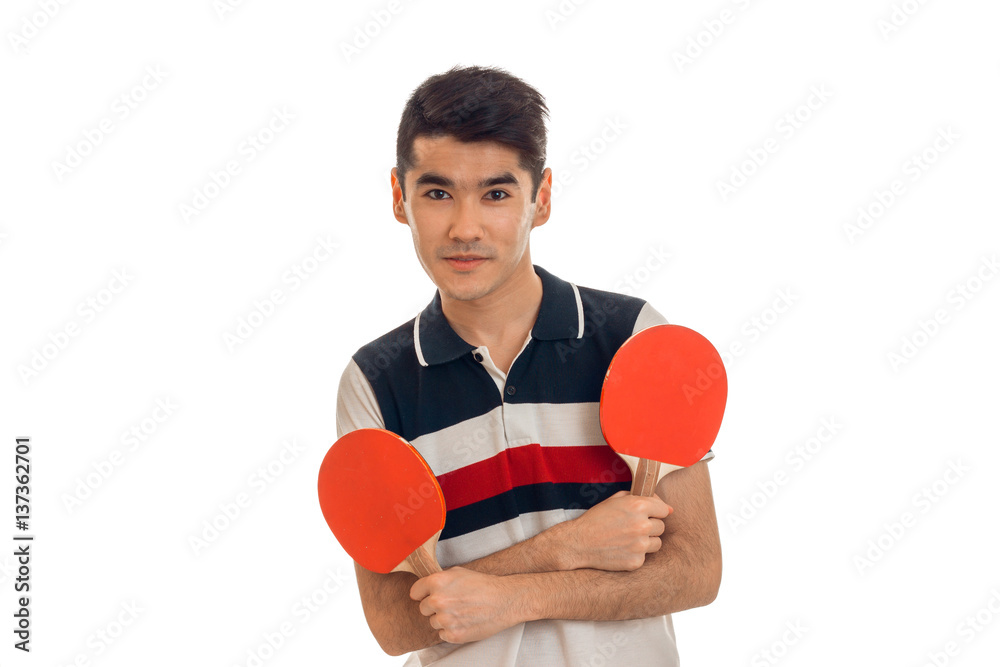 young brunette sports man practicing ping-ping isolated on white background young brunette sports man practicing ping-ping isolated on white background
