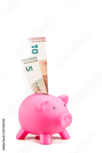 Piggybank with ten and five Euro banknotes