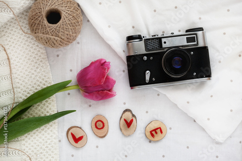 vintage camera, flower and inscription on a white background
