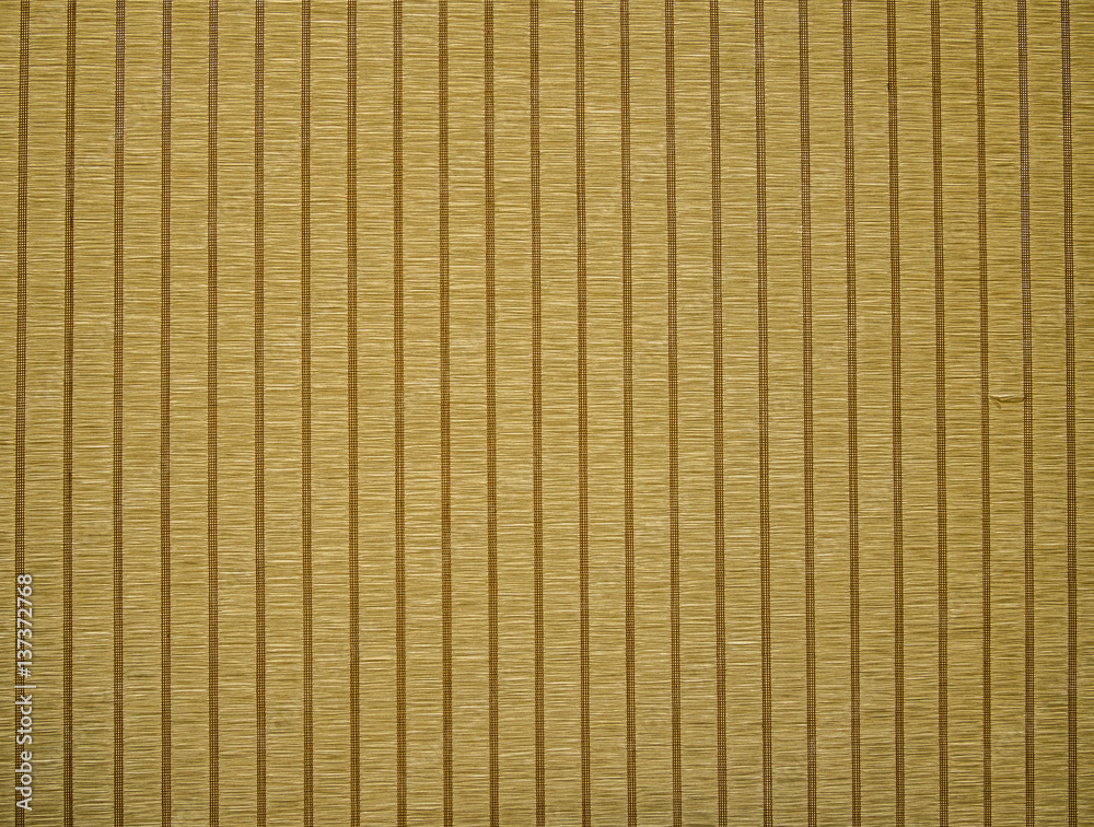 Natural fibers bonded by weaving transverse threads to form a flat fabric with contrasting cross lines and rhythmic background. Natural fibers bonded by weaving transverse threads to form a flat fabric with contrasting cross lines and rhythmic background.