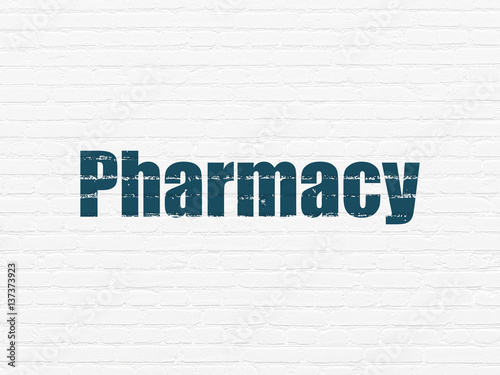 Medicine concept: Pharmacy on wall background