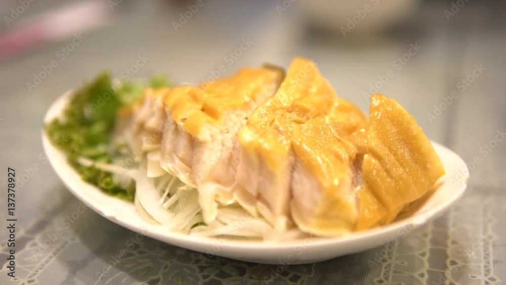 4K of Shark meat in asia. Waiter serve the dish Smoked shark steak. Cooked in chinese restaurant. Shot in Taipei, Taiwan. -Dan 4K of Shark meat in asia. Waiter serve the dish Smoked shark steak. Cooked in chinese restaurant. Shot in Taipei, Taiwan. -Dan