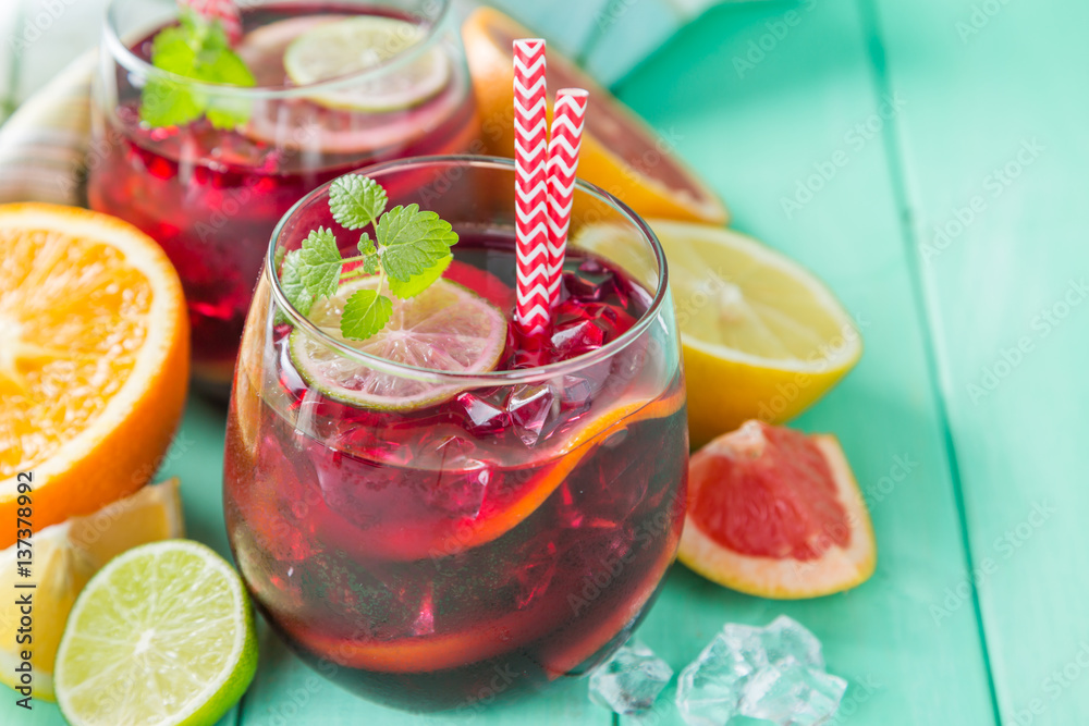 Sangria and ingredients in glasses Sangria and ingredients in glasses