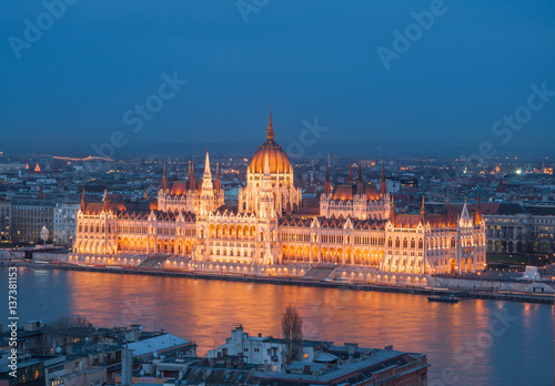 Evening view of the Hungarian Parliament Building on the bank of the Danube in Budapest, Hungary