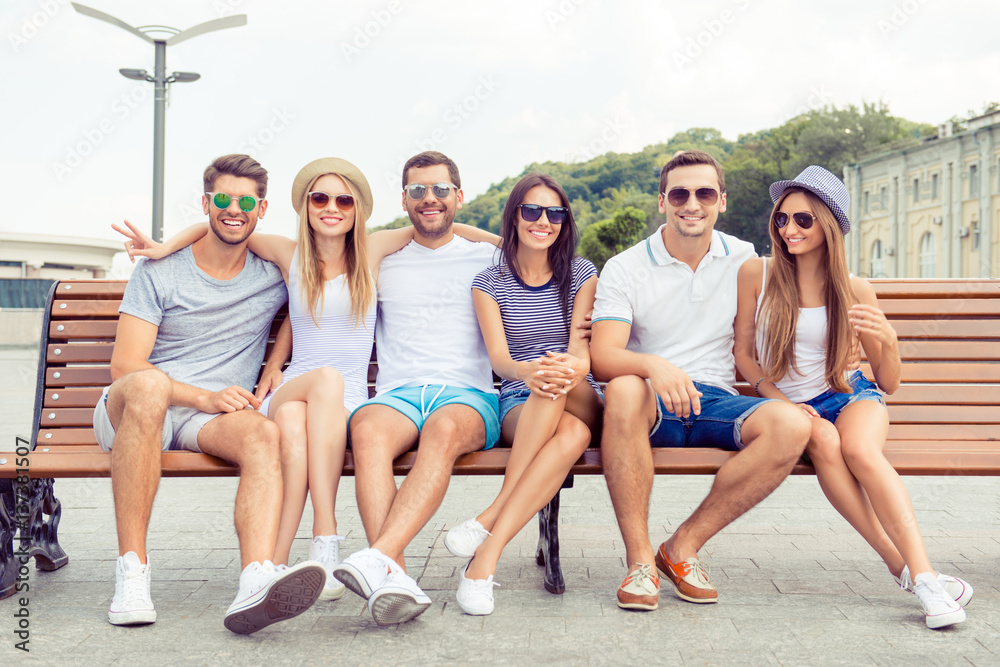 Group of successful joyful boyfriends and girlfriends having fun Group of successful joyful boyfriends and girlfriends having fun