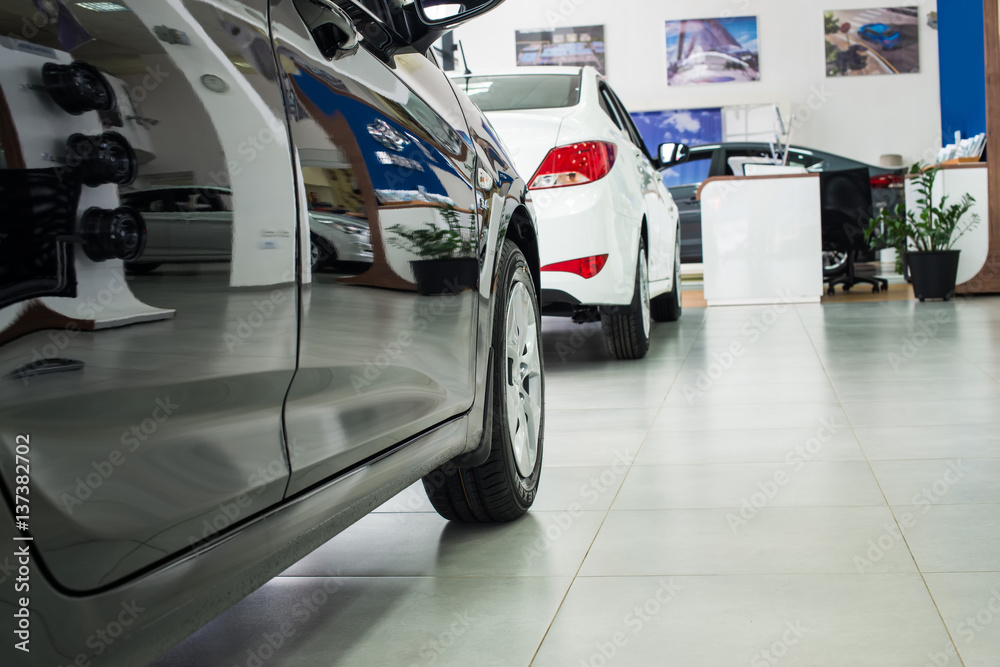 New cars at dealer showroom New cars at dealer showroom