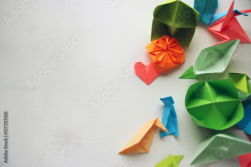 Multicolored Origami on a white table