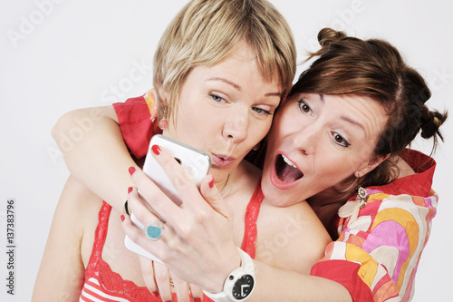 Selfie. Happy smiling attractive hipster women looking at camera. isolated on white background. photo