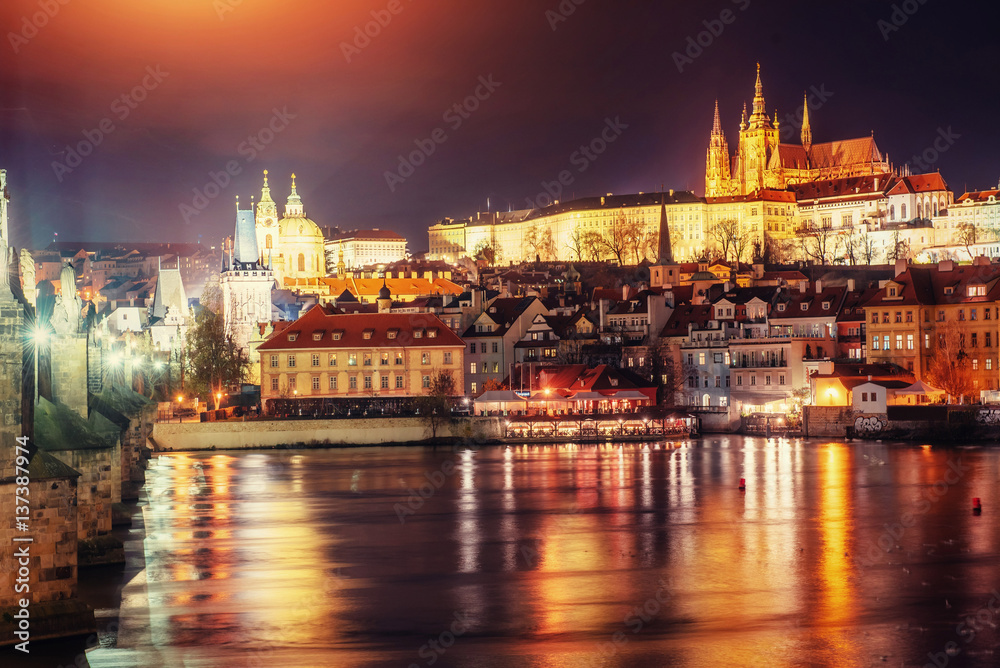 Naklejka premium view of Prague castle from Charles bridge at night
