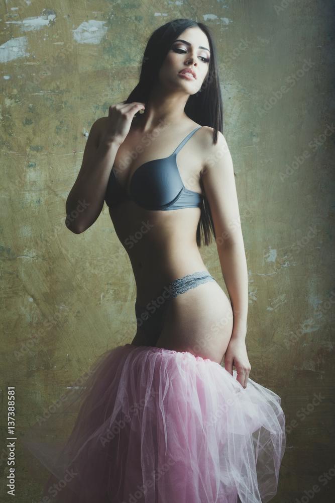 pretty sexy woman in pink skirt and bra on body pretty sexy woman in pink skirt and bra on body
