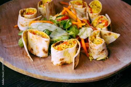 Tortilla wraps with rice and vegetables. Healthy vegetarian food.