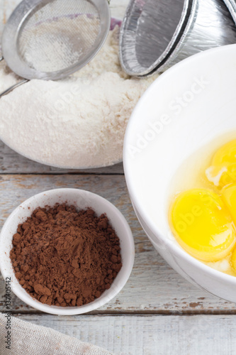 flour, cocoa, eggs, baking dishes