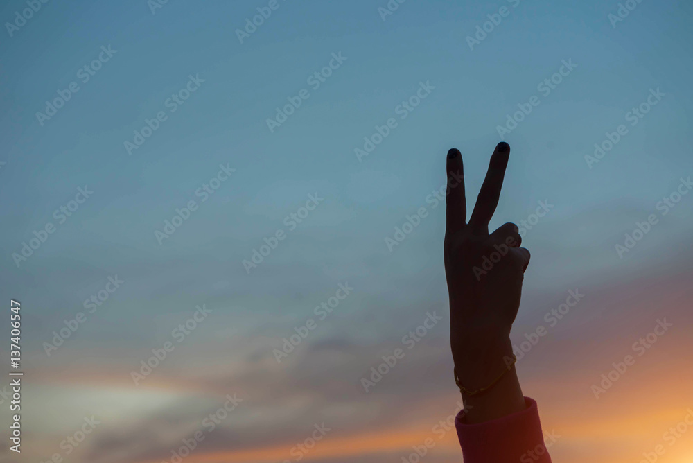 Shadow of two fingers at sunset Shadow of two fingers at sunset