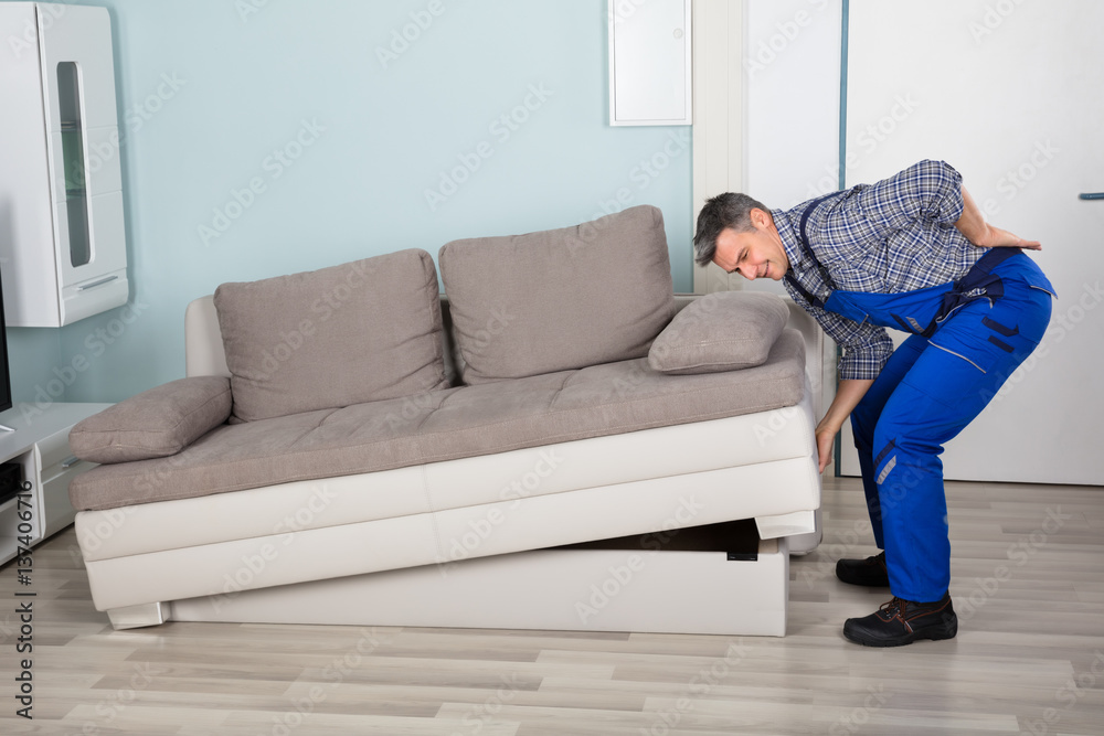 Worker Suffered From Back Pain While Lifting Sofa Worker Suffered From Back Pain While Lifting Sofa