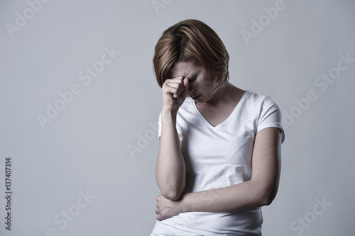 devastated depressed woman crying sad feeling hurt suffering depression in sadness emotion © Wordley Calvo Stock