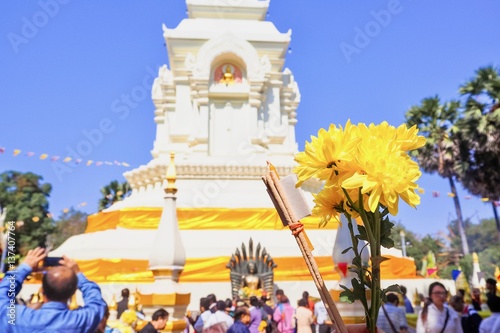Buddhist Pilgrims at Wat Phra That Bang Phuan in Nong Khai, Thailand photo