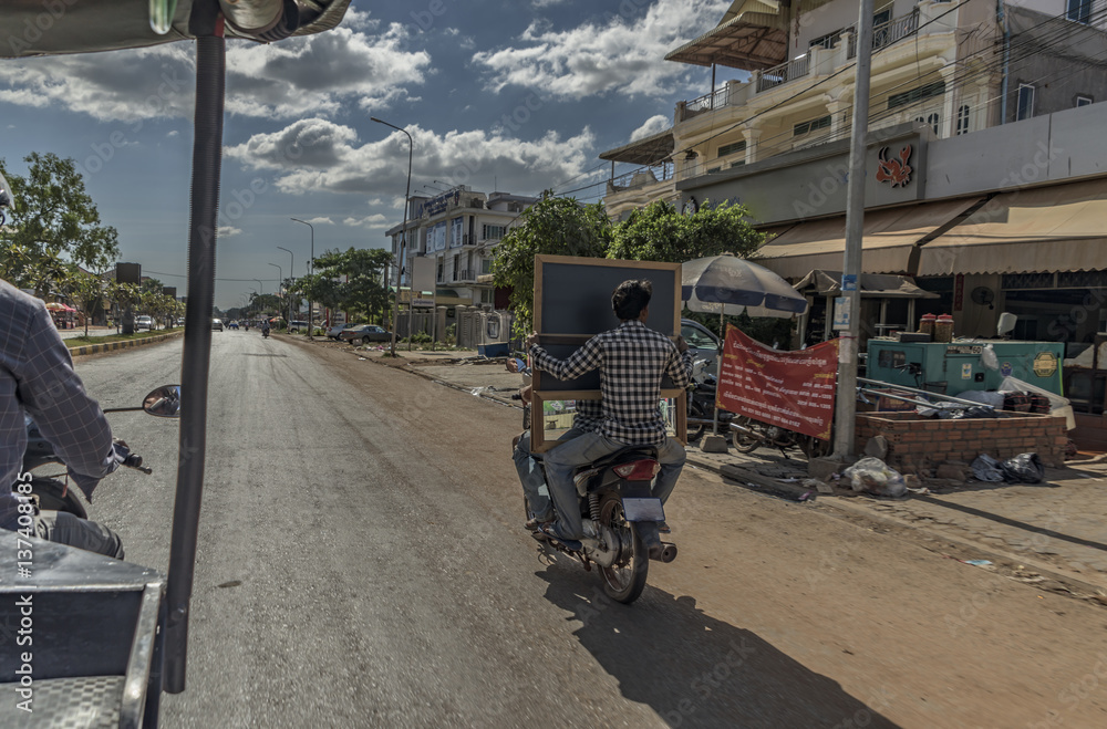 Tuk Tuk and motorbike in Siem Reap