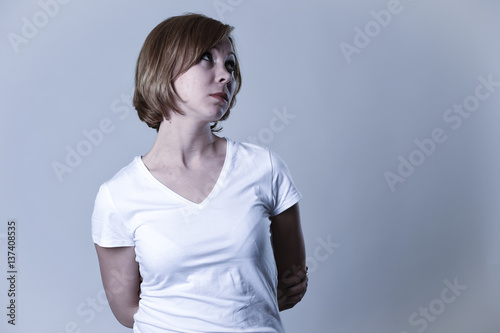  portrait young beautiful woman on her 30s sad and depressed in breakdown suffering depression photo