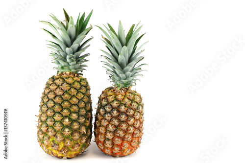  two fresh pineapples isolated on white background