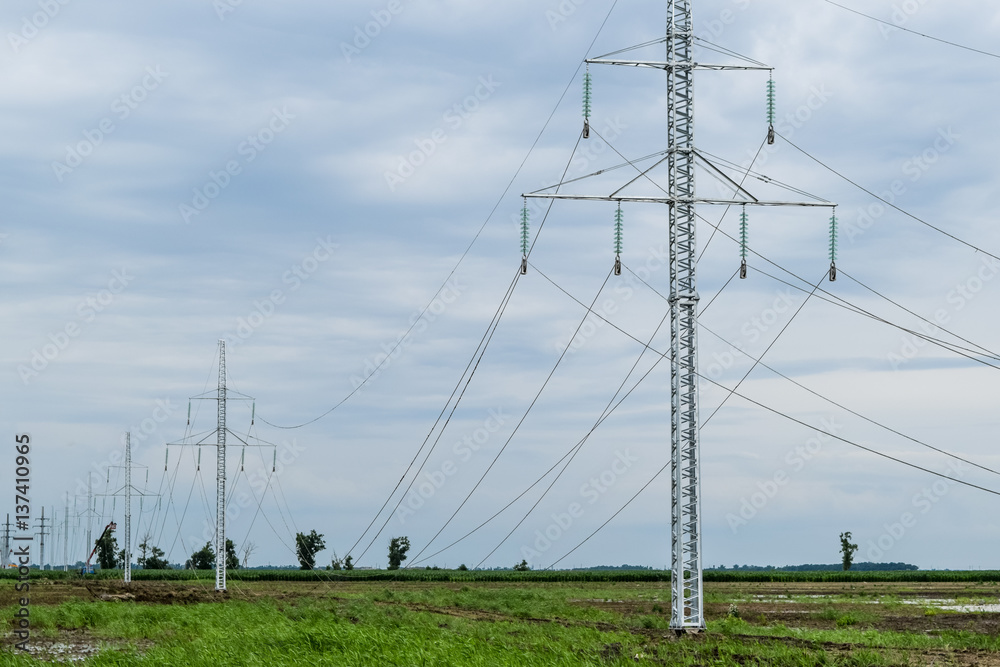 Obraz premium Assembly and installation of new support of a power line
