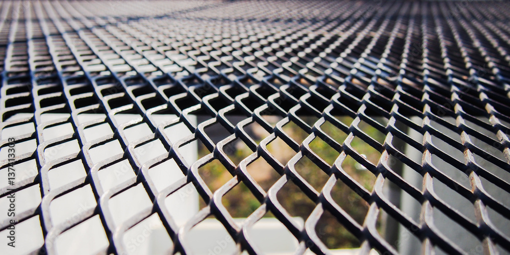 Naklejka premium Black metal mesh floor