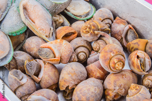 seafood in bucket with flower