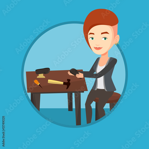 Shoemaker making handmade shoes in workshop.