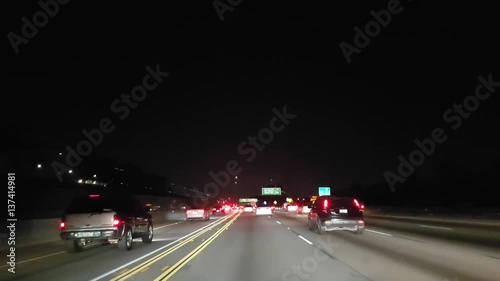 Driving on a road interstate 405 at night time, in Los angeles, California, in United states of America photo