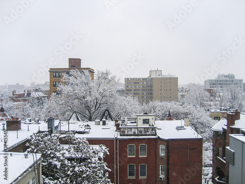 Cityscape or skyline of Washington DC Dupont Circle apartment buildings in winter snow photo