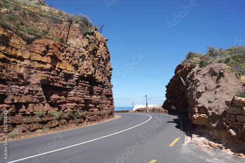 Beautiful  road though the red stone hill near Cape point in Cape town