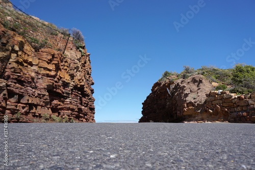 Beautiful  road though the red stone hill near Cape point in Cape town